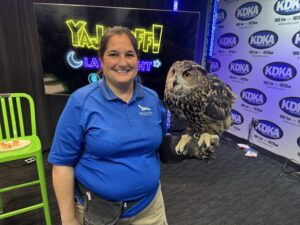 Cathy Schlott - National Aviary She’s baaaackkk and just in time to celebrate Owl-O-Ween! She brought “Pumpkin” with her. Also, as Owl-O-Ween closes, remember the holiday brunches featuring the chance to snap photos with Santa and a Penguin and…. for the first time ever the Grinch along with a skunk or an owl!